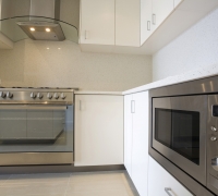 Smart kitchen with custom washing machine attached kitchen