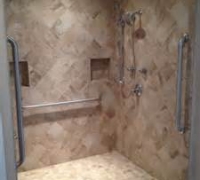bathroom with grab bar for child shower