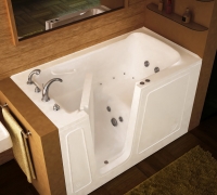 wooden floored bathroom with custom bath tub